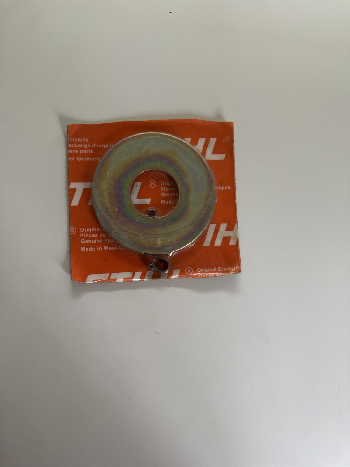 Stihl 1110 190 0600 Recoil Rewind Starter Spiral Spring OEM NOS product image